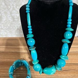 Tagua nut necklace in a beautiful turquoise color. It is approx. 18” in length.